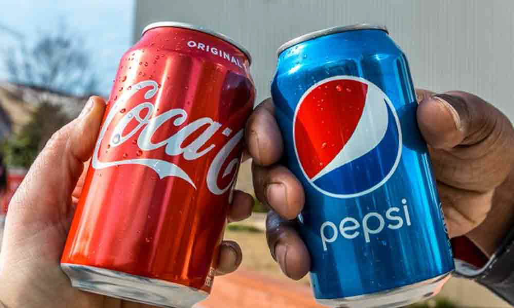 Cổ phiếu Coca-Cola “so kè” PepsiCo: ông lớn nước giải khát nào đáng mua hơn?