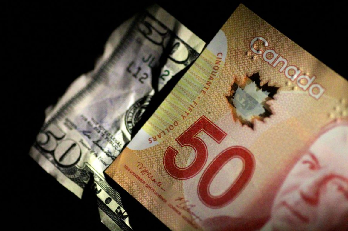 USD/CAD dao động quanh mức 1,3520 khi thị trường có tâm lý thận trọng
