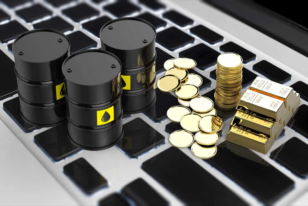 Giá vàng tăng hơn 1%, dầu tiếp tục đi lên
